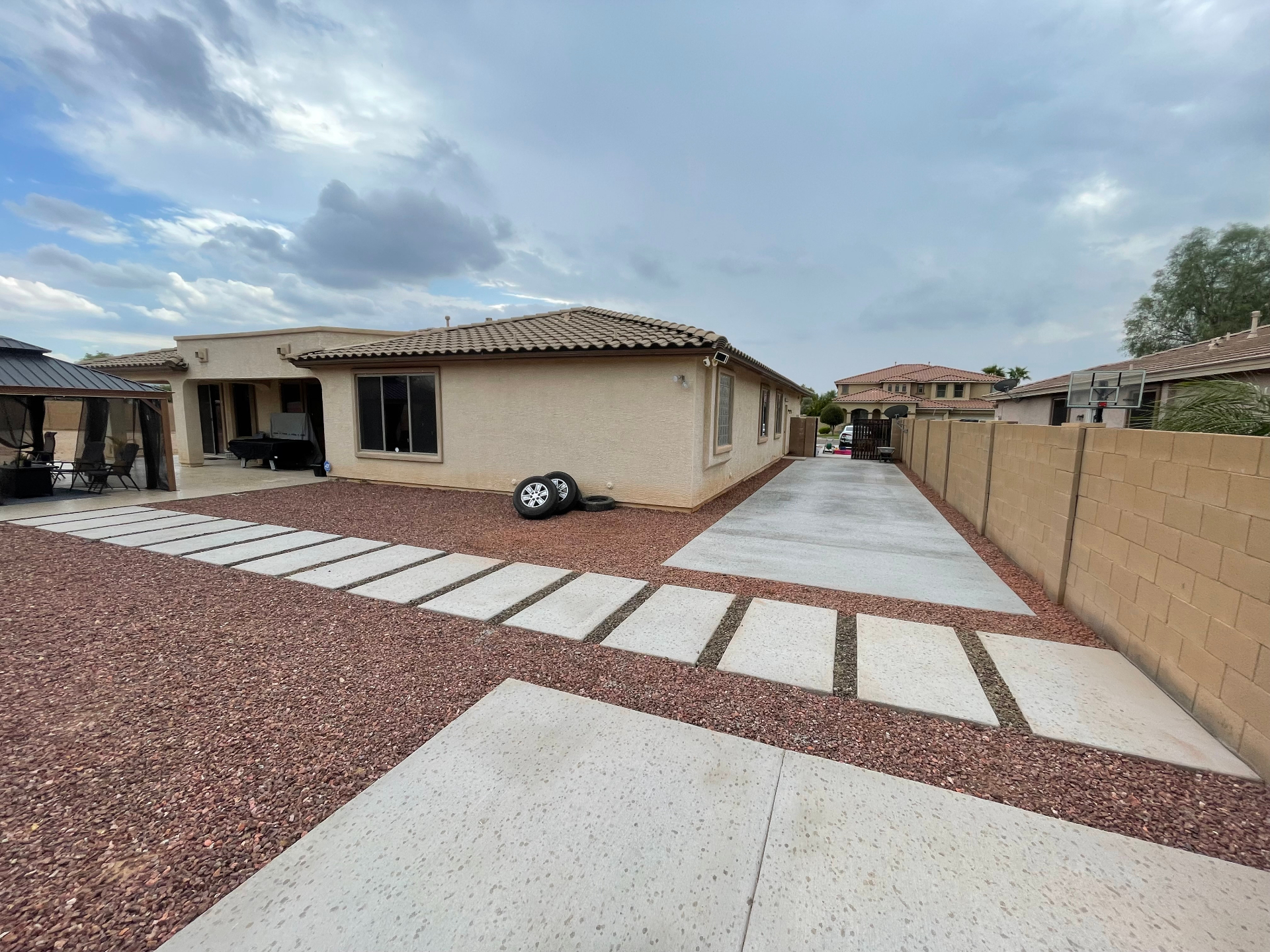 Concrete Driveway Extension with Decorative Stepping Pads by Arizona Precision Concrete in Phoenix, AZ